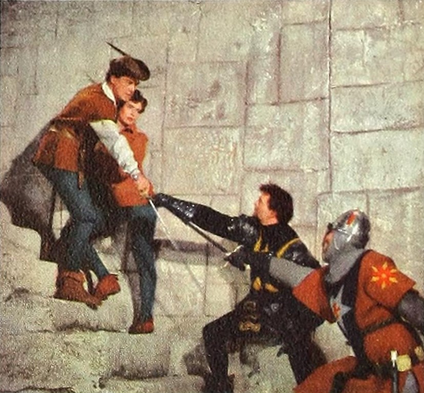 Color film still from the 1938 movie The Adventures of Robin Hood starring Errol Flynn in a sword fight.